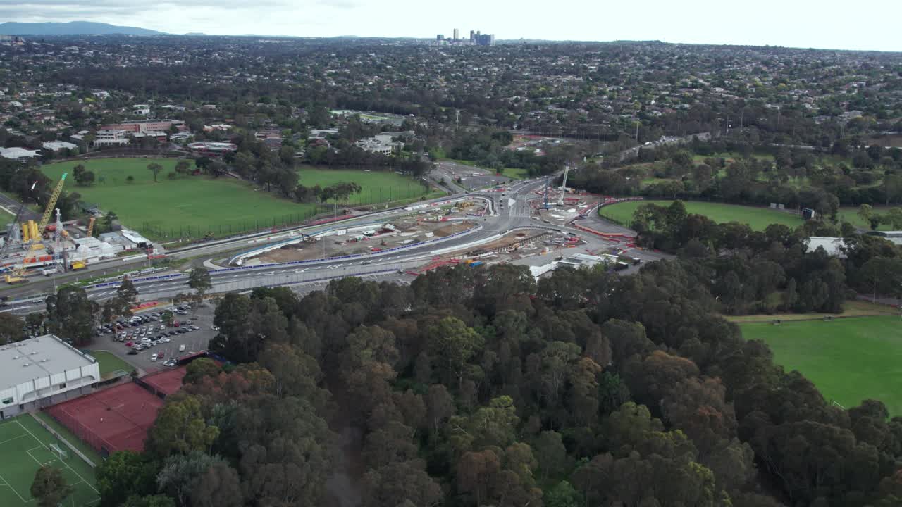Aerial view looking towards the Bulleen Road interchange with the Eastern Freeway during construction of the North East Link project in December 2023, Victoria, Australia.