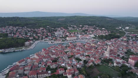 historical croatian town of stari grad hvar in dalmatia, aerial circle pan shot