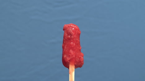 time lapse closeup of an ice pop melting