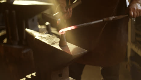 blacksmith forging metal