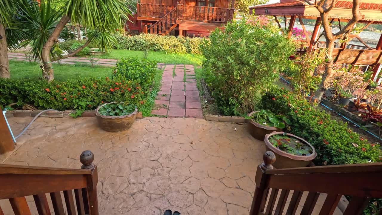 Wooden house with lush garden in Ayutthaya