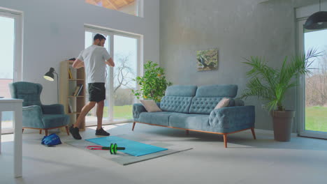 man doing exercise at home