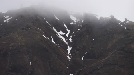 Large-Iceland-Mountain-with-Fog-and-Snow-in-4K