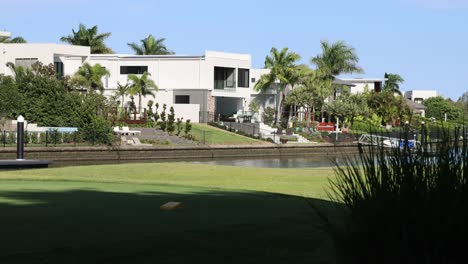 peaceful view of upscale homes by a lake