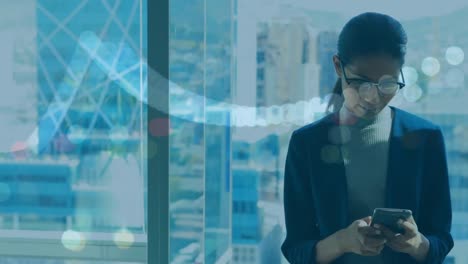 woman using smartphone and lights