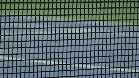 a close-up view showcasing the rubber composition of a professional tennis net tailored for atp events