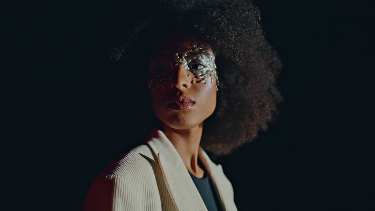 Closeup party girl look distance with trendy glitters makeup in dark background