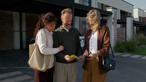 family viewing a new home brochure