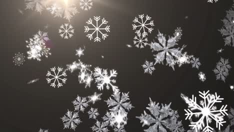 digital animation of snow flakes falling against bright spot of light against black background