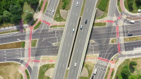 summer aerial footage of transport junction, traffic cross road junction day view from above with highway road