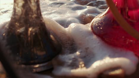 pipa de agua en la playa