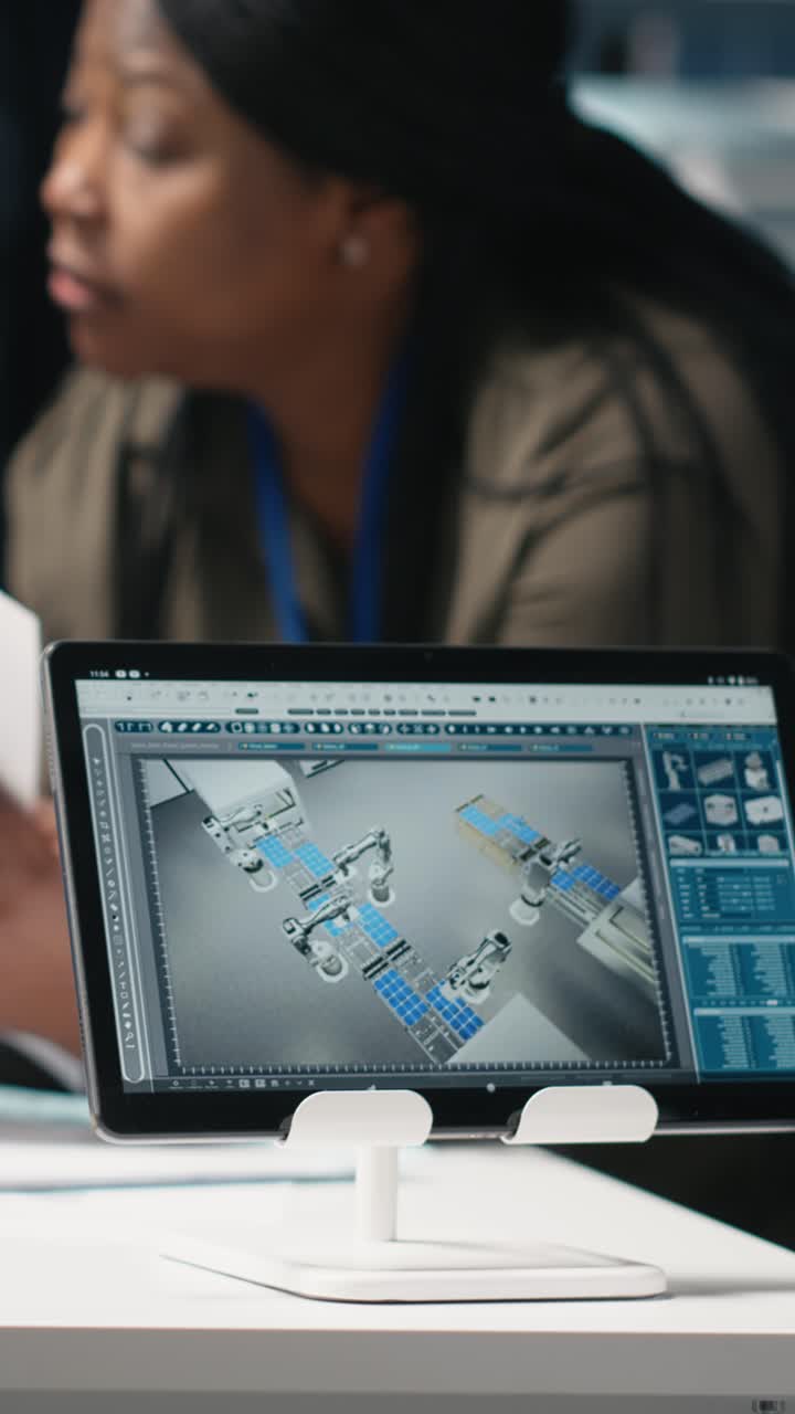 Vertical Video African american manufacturing experts gather in a solar power plant