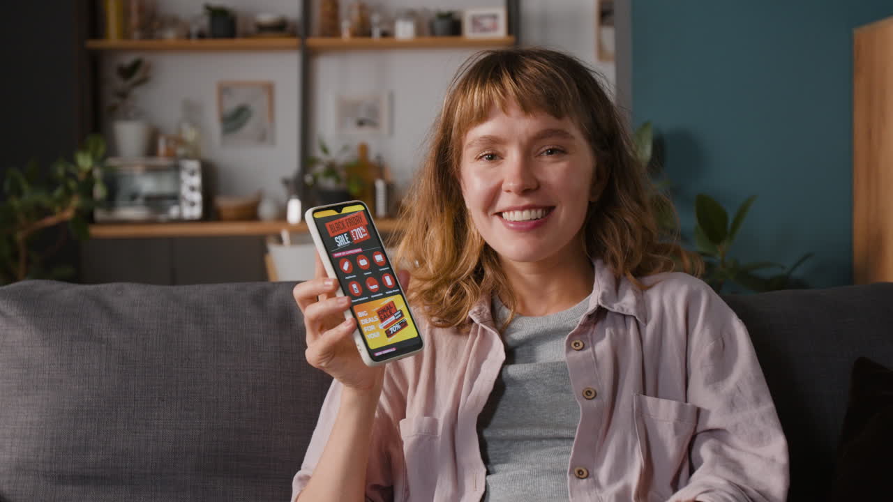Woman using phone for online shopping