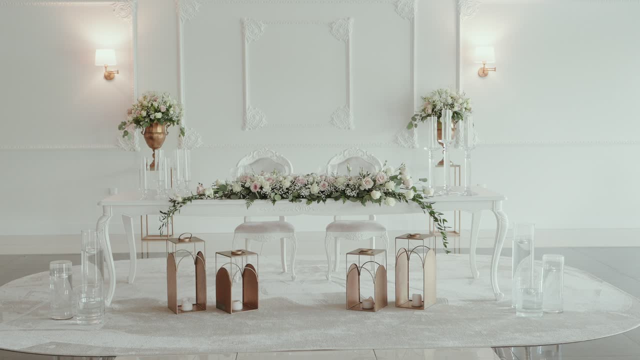 Romantic white wedding reception table with flowers and lanterns ...