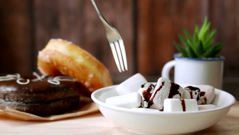 marshmallow and donuts on the table