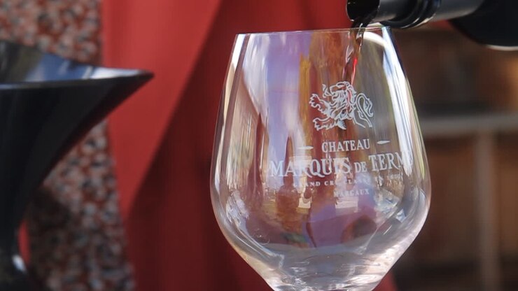 Wine being poured into a glass