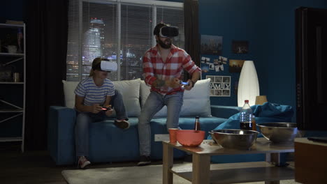 couple playing vr games at home
