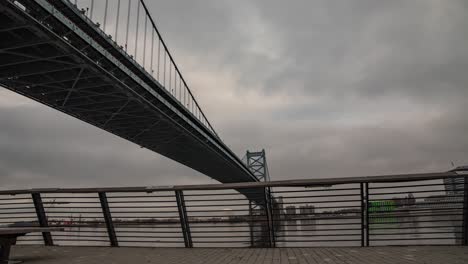 timelapse of the ben franklin bridge in philadelphia, pa during the morning in december