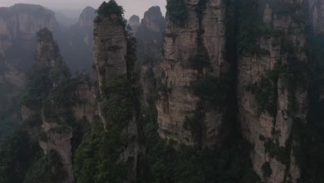 drone shot of zhangjiajie national park in china, karst mountains all over the place