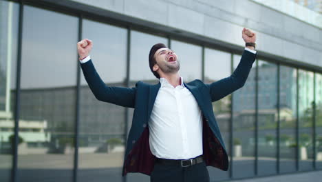 young business man getting promotion outdoors