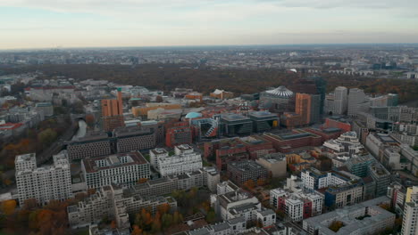 High-above-Berlin-Skyline-Office-Buildings-at-Potsdamer-Platz-in-Autumn,-Aerial-Wide-Angle-forward-in-Berlin,-Germany