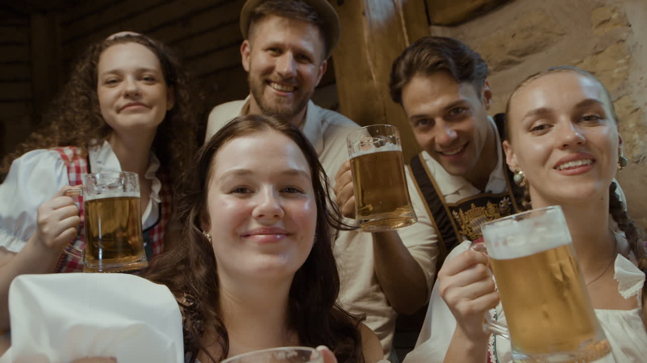 People celebrating Oktoberfest with beer