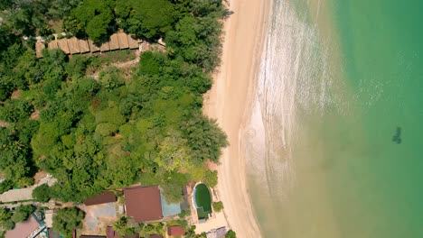 4K-Cinematic-nature-drone-footage-of-a-panoramic-aerial-view-of-the-beautiful-beaches-and-mountains-on-the-island-of-Koh-Lanta-in-Krabi,-South-Thailand,on-a-sunny-day