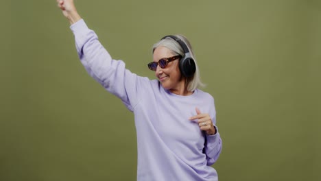 senior woman dancing to music