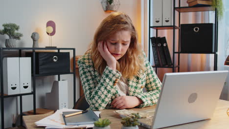 business woman freelancer counting cash insufficient amount of money, financial crisis, bankruptcy