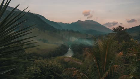 sunset time lapse of nature, mountains, plants and a river in lanquin, semuc champey, guatemala