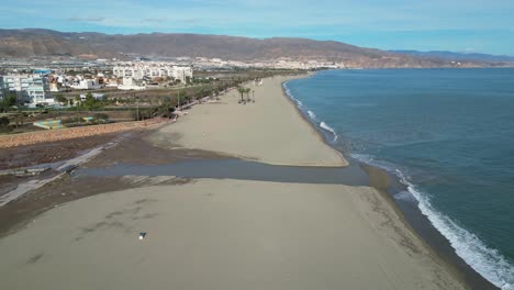 roquetas de mar long sandy beach in almeria, andalusia, spain - aerial