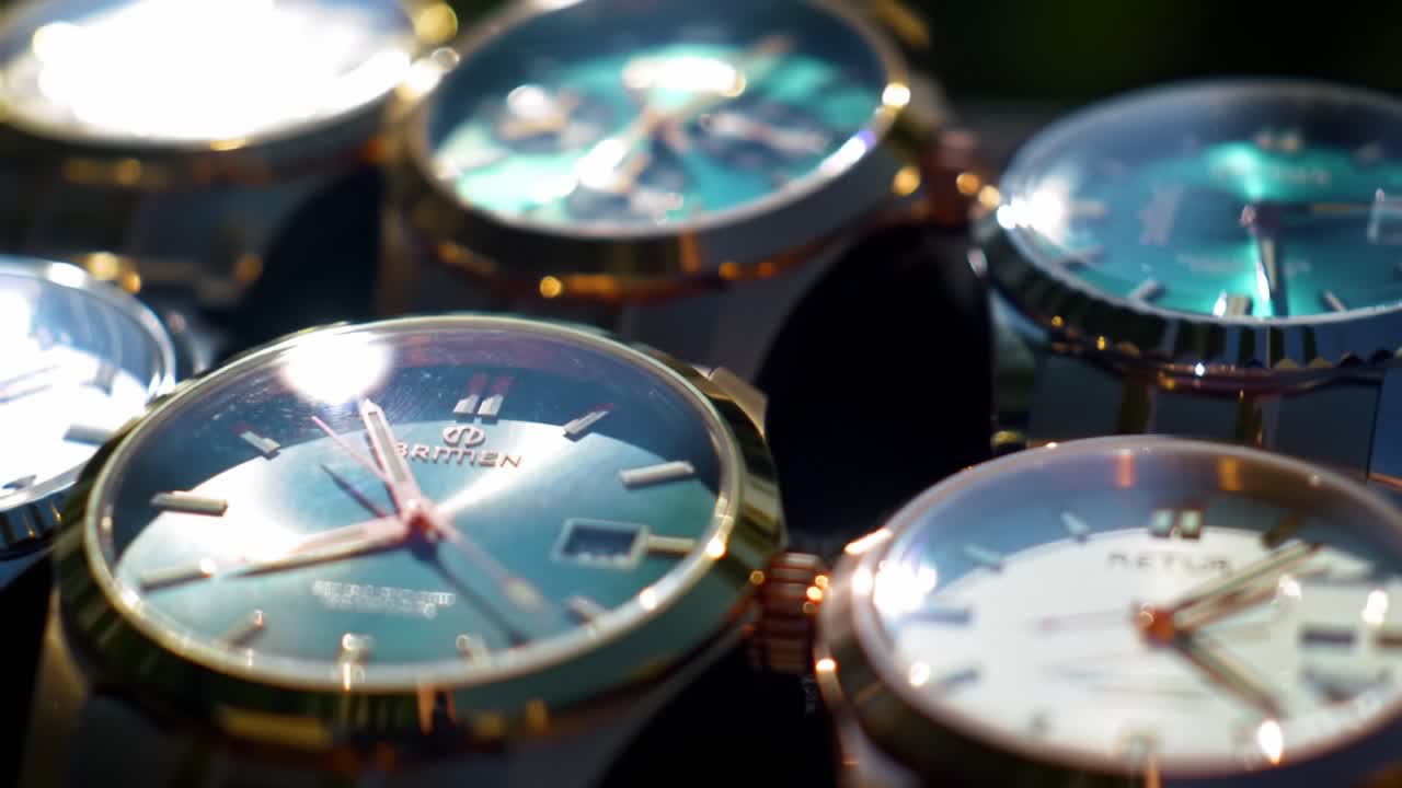 A Captivating Display of Luxurious Timepieces Showcasing Intricate Designs and Artful Craftsmanship in Various Styles and Colors