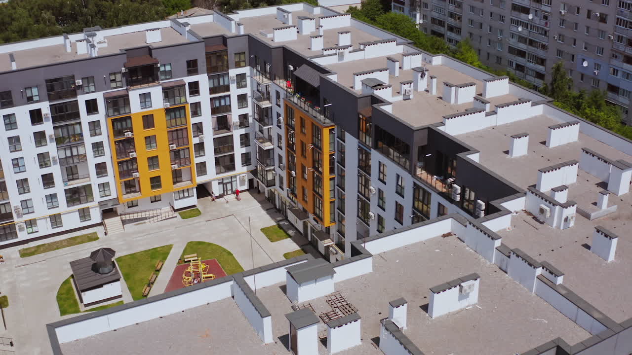 Aerial View Of Luxury Apartment Buildings. Contemporary apartment building with colorful walls of the facade
