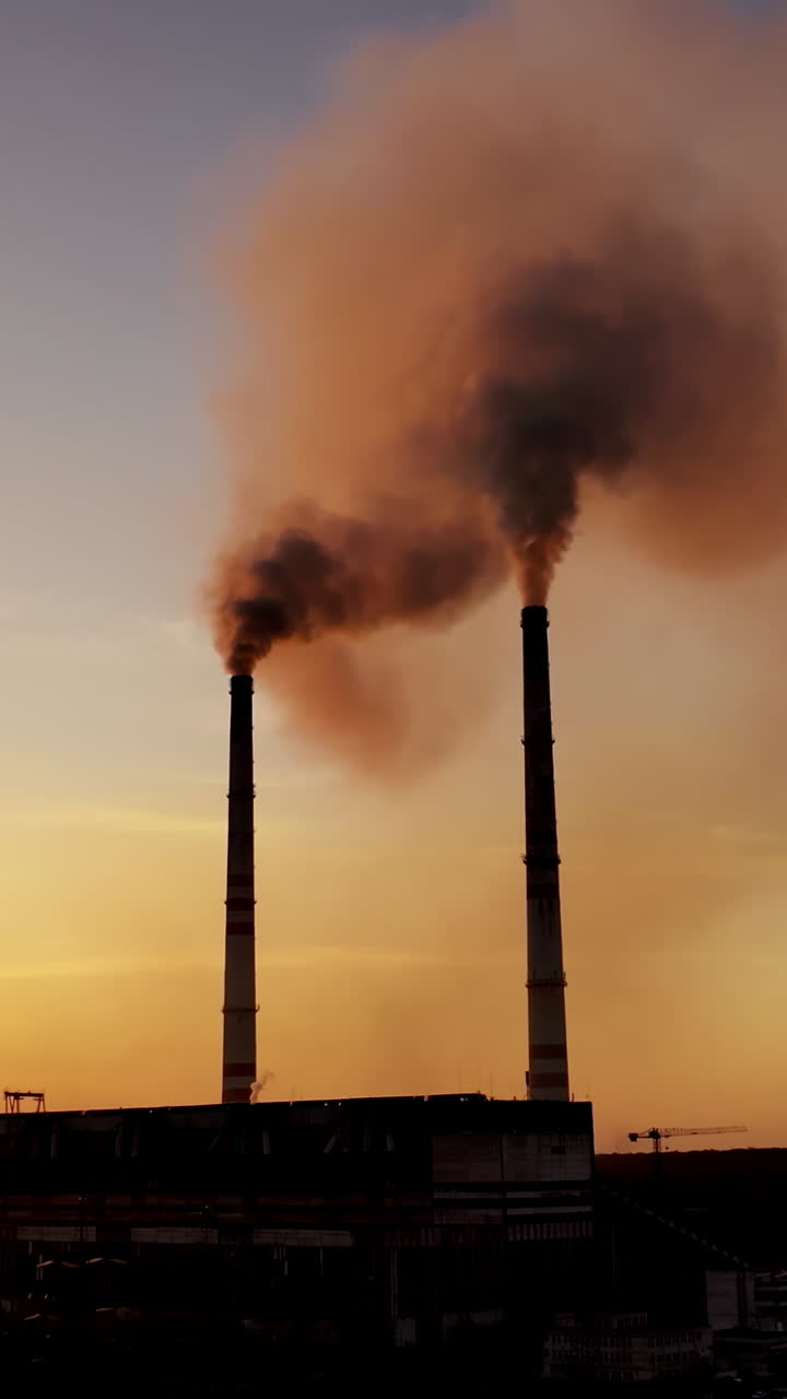 Industry Landscape Increasing Air Pollution. Smoked polluted atmosphere from emissions of plants and factories Vertical video