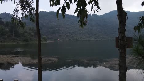 Laguna-de-calderas,-a-crater-lake-in-the-municipality-of-Amatitlan,-Guatemala-north-of-the-active-vent-of-the-pacaya-volcano