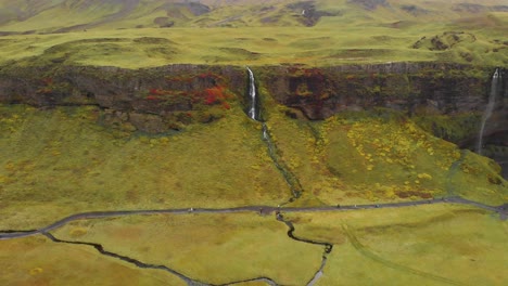 Hiking-trails-and-Seljalandsfoss-waterfall-in-nordic-Iceland-landscape