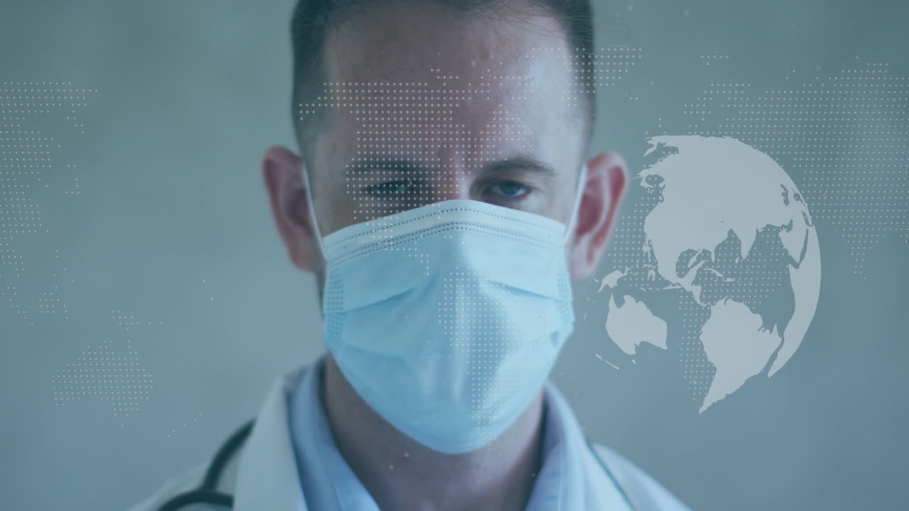 Animation of globe and world map over caucasian male doctor with face mask