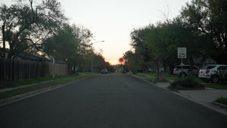 sunrise on an american street road in a quiet neighborhood