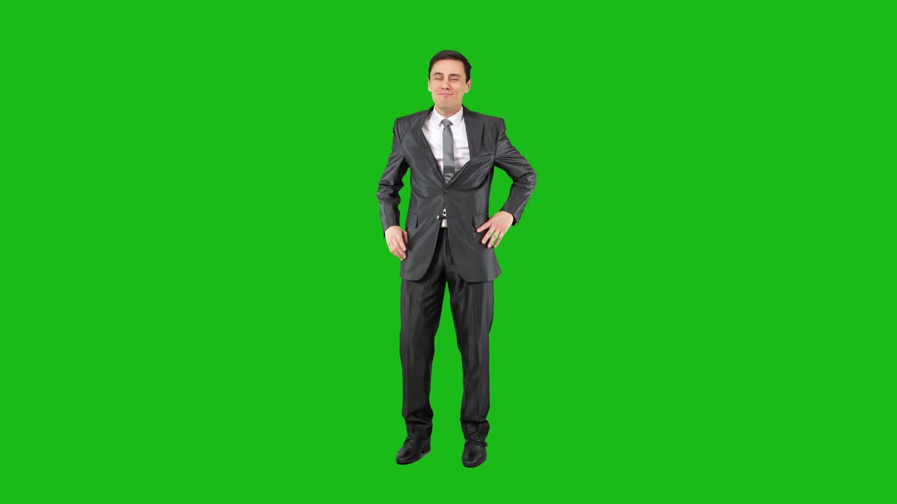 Happy Businessman Relaxing on Green Screen