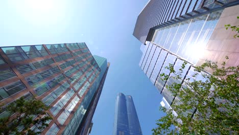 looking up at skyscraper buildings in new york city in 4k slow motion 60fps