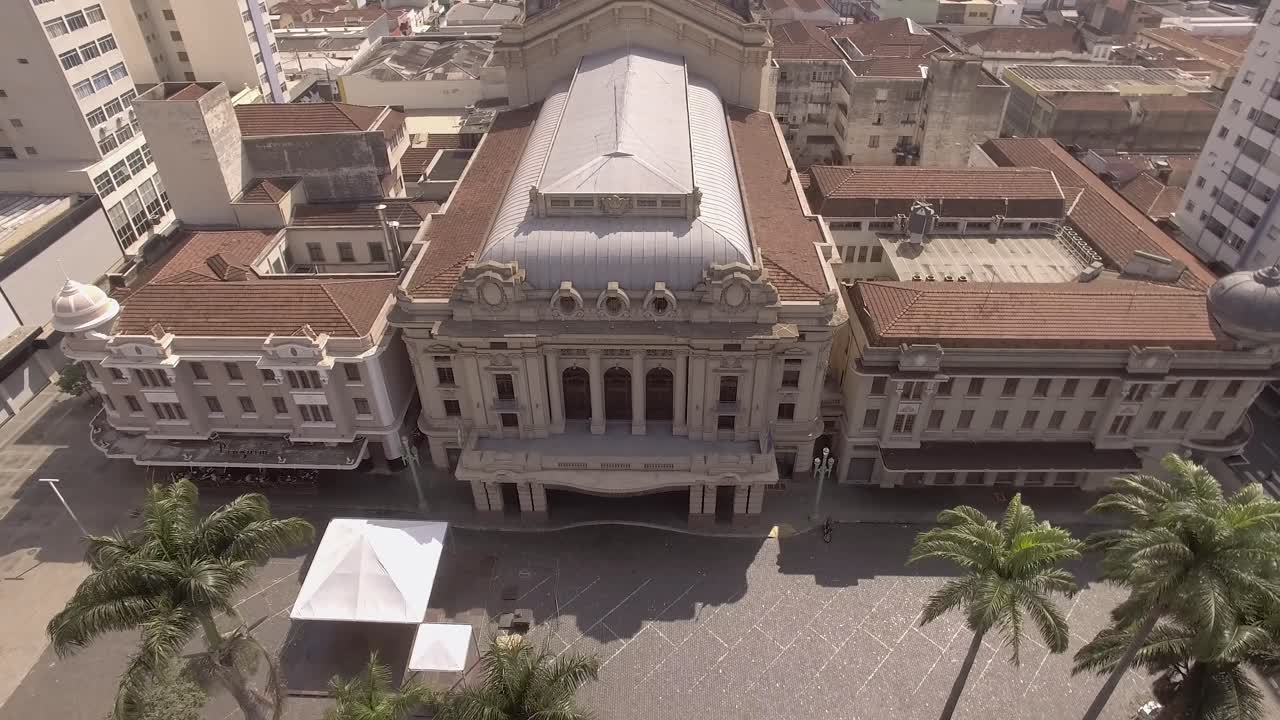 Aerial View of Cityscape with Buildings and Palm Trees