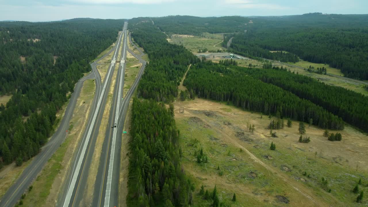 US, Oregon, Meacham, 2025-08-03 - Drone view of I84 running through the forest in the mountains