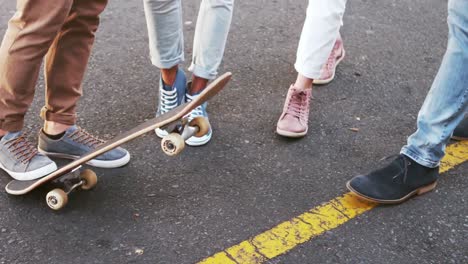 view of hipster friends feet