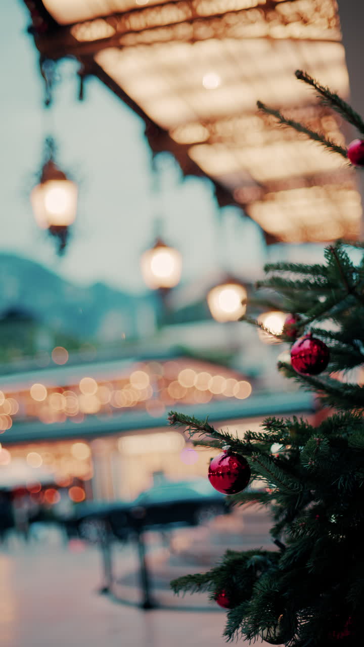 Close up of decorations on a Christmas tree in front of the Monte Carlo Casino in Monaco