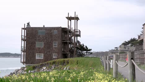 old hotel and footpath by the beach