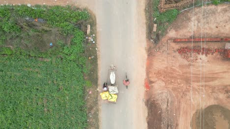 bullock-cart-moving-front-from-top-view-wide-view