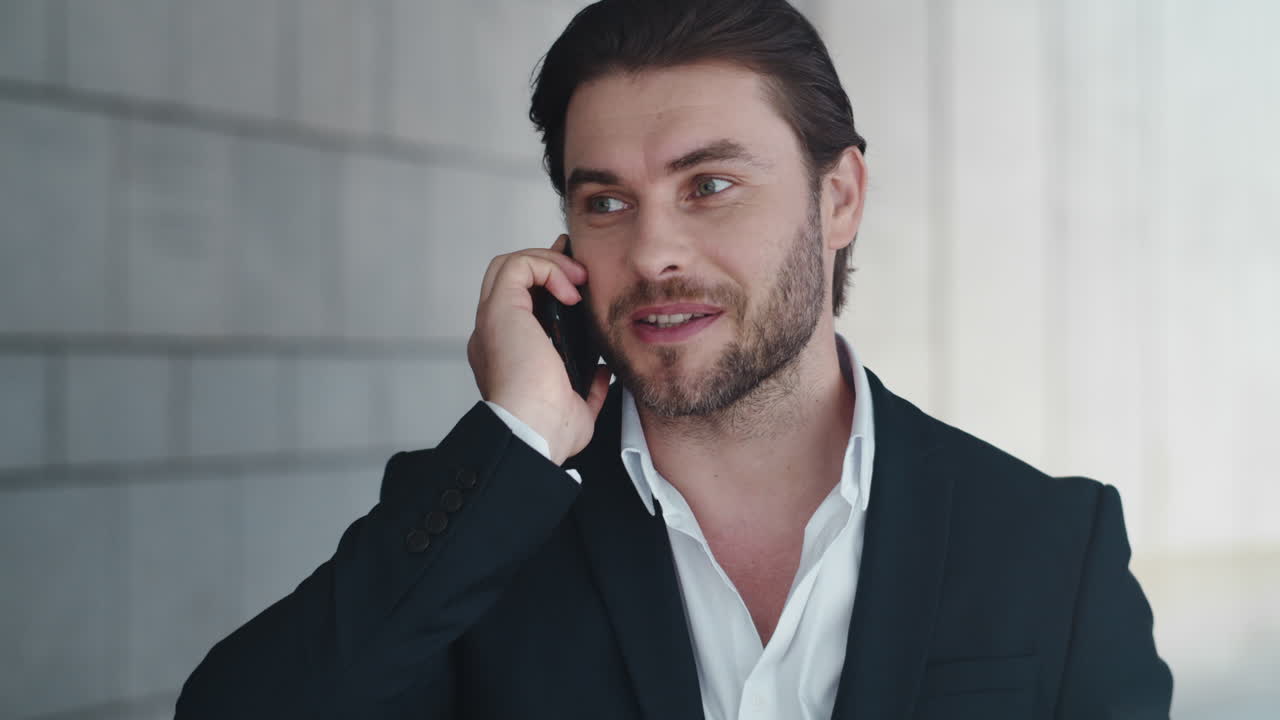 Man calling on smartphone in city | Free Stock Video Footage