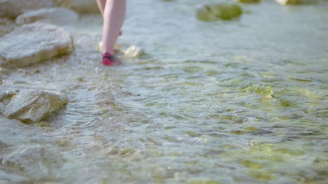 Woman-Walking-At-Seashore-In-Summer-1