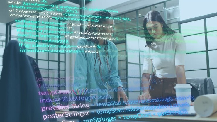 Animation of computer language over diverse female architects discussing on blueprint in office