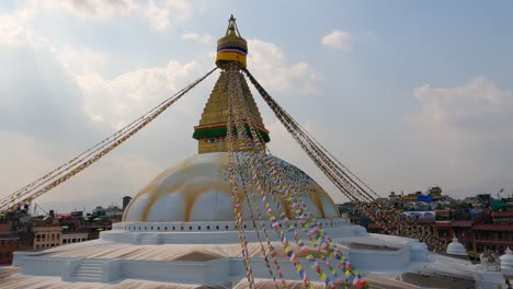 kathmandu, nepal - november 1, 2021: a view of the boudhanath stupa with its many prayer flags in kathmandu, nepal